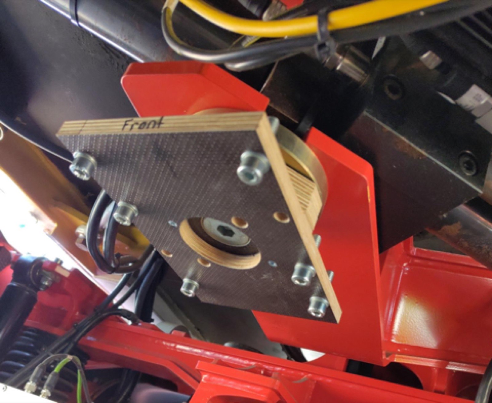 A localisation sensor mount on the TX4 bogie, a plate marked Front with cabling.