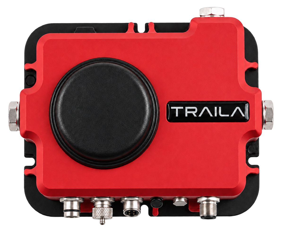 Traila Tuner seen from above: the sensor dome, the label and the connector row.